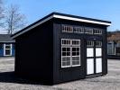 10x14 Lean-To Storage Shed with black LP SmartSide siding full row of transom windows along the high 14' side with two windows and a double door on the same side