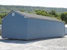 14x32 Peak Single-Car Garage With Twilight Blue Vinyl Siding, White Overhead Door, Black Shutters, and Shingle Roof